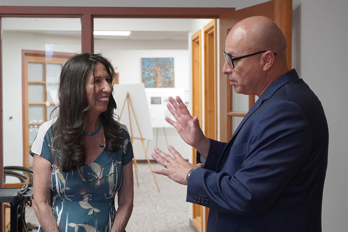 Congresswoman Teresa Leger Fernández speaks with NNMC President Hector Balderas